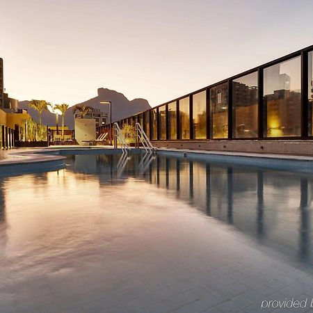 Hotel Radisson Rio De Janeiro Barra Esterno foto The rooftop pool at the hotel