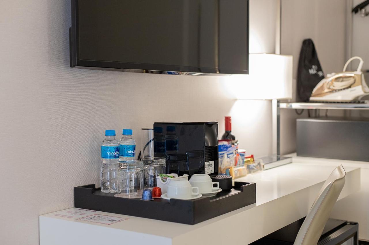 Hotel Radisson Rio De Janeiro Barra Esterno foto A Nespresso machine in a hotel room