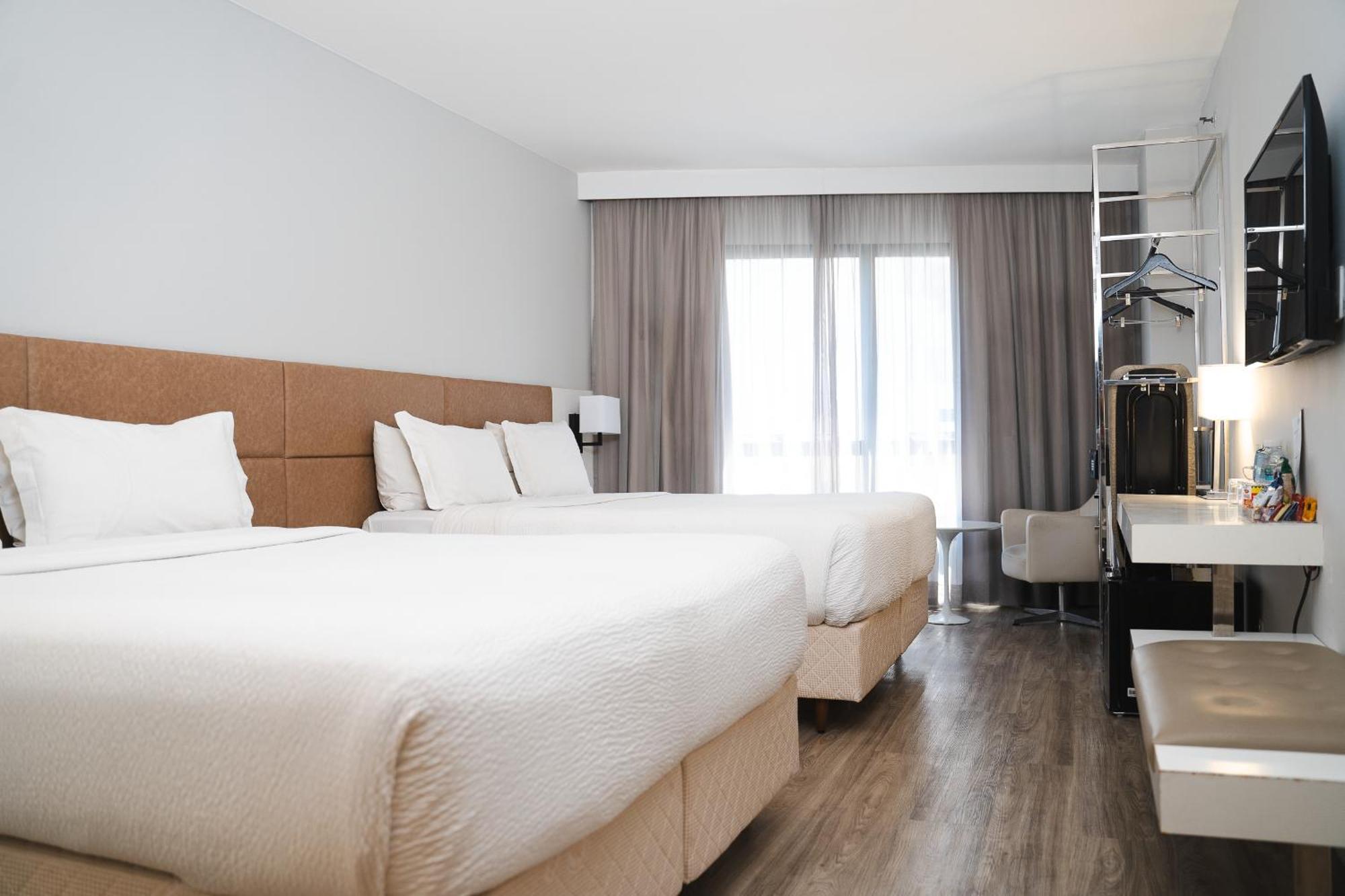 Hotel Radisson Rio De Janeiro Barra Esterno foto A typical room at the hotel