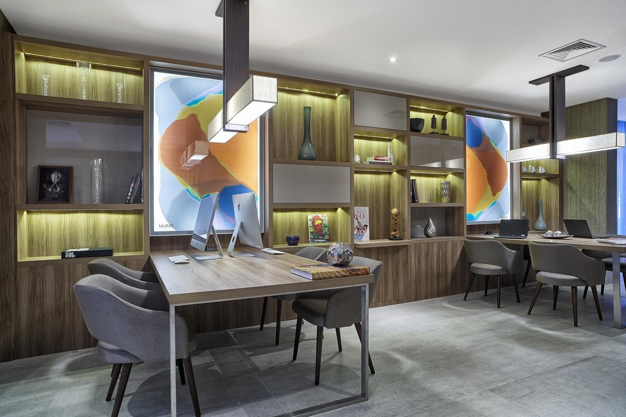 Hotel Radisson Rio De Janeiro Barra Esterno foto The interior of the library